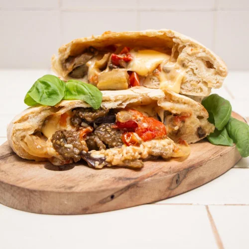 Calzone de jamón y vegetarianos